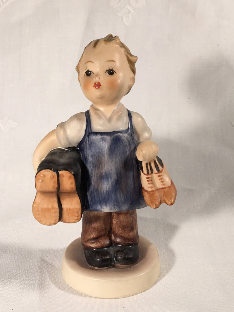 Goebel Hummel TMK3 #143/0 "Boots" (Boy Carrying Boots) 5" Tall   - TvMovieCards.com