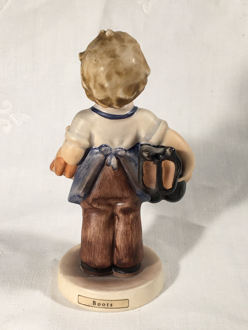 Goebel Hummel TMK3 #143/0 "Boots" (Boy Carrying Boots) 5" Tall   - TvMovieCards.com