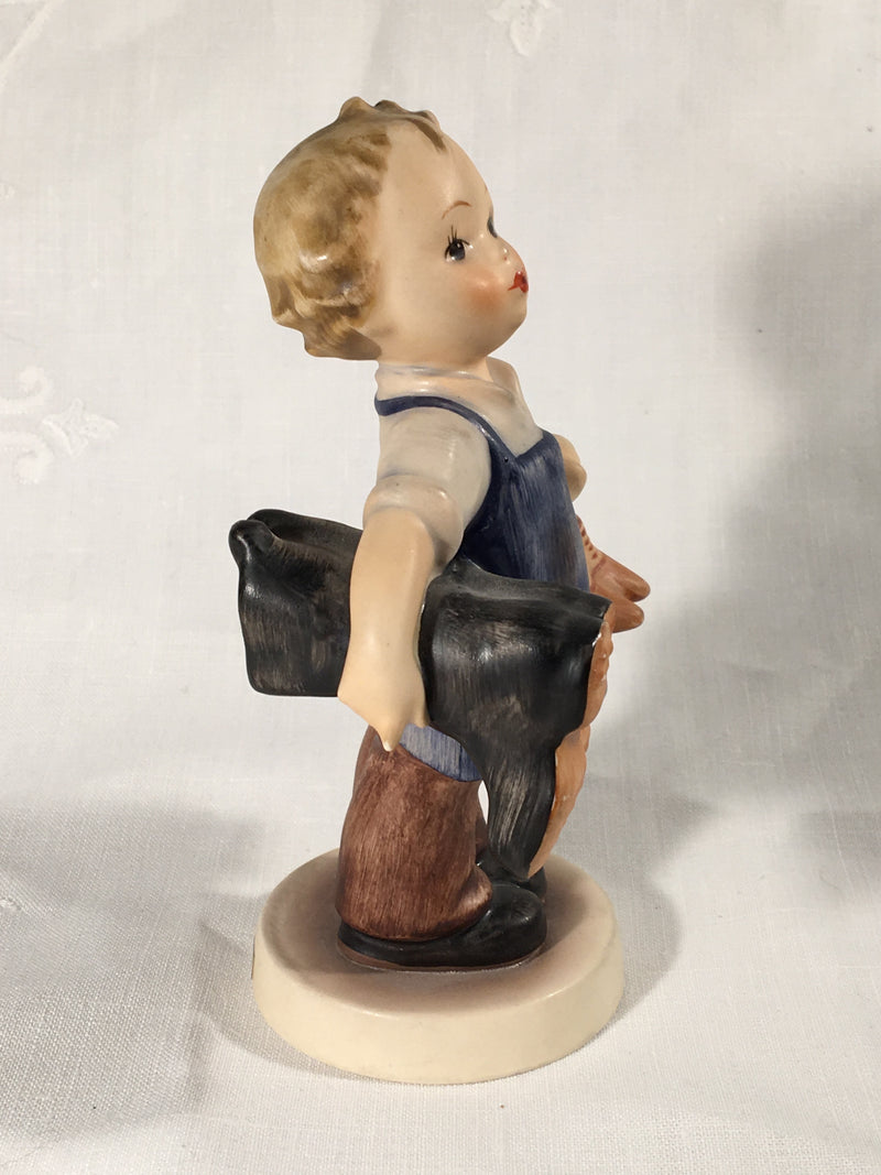 Goebel Hummel TMK3 #143/0 "Boots" (Boy Carrying Boots) 5" Tall   - TvMovieCards.com